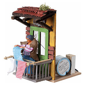 Woman hanging laundry with motion, 15x10x15 cm, for 10 cm Neapolitan Nativity Scene