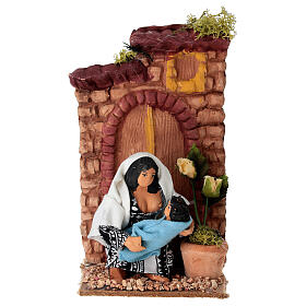 Donna che allatta con movimento presepe 10 cm 10x15x15 cm