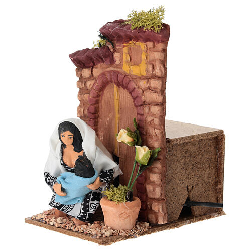 Donna che allatta con movimento presepe 10 cm 10x15x15 cm 3