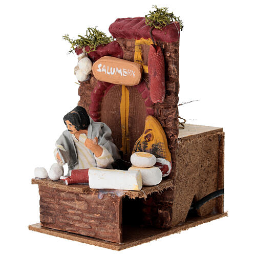 Marchand de charcuterie animé pour crèche 10 cm 10x15x15 cm 2