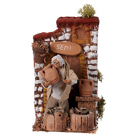 Venditore di semi con movimento 15x10x15 cm presepe 10 cm