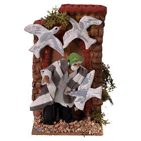 Escena hombre con palomas movimiento belén 15x10x10 cm belén 10 cm