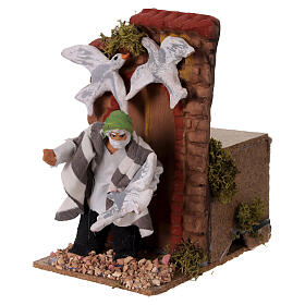 Escena hombre con palomas movimiento belén 15x10x10 cm belén 10 cm