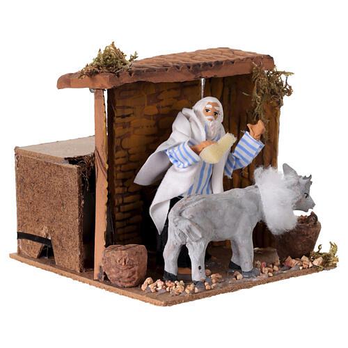 Animated 10 cm Nativity Scene: man washing his donkey, 10x15x15 cm 3