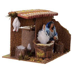 Animated Woman plucking hens 10x15x15 cm, 10 cm Nativity Scene