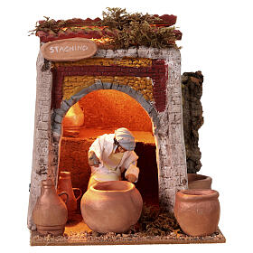 Bottega stagnino presepe 10 cm movimento 18x18x18 cm