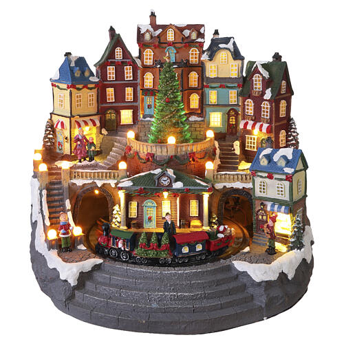 Pueblo navideño 40x40x30 cm ciudad con tren y árbol en movimiento LED multicolores y música 1