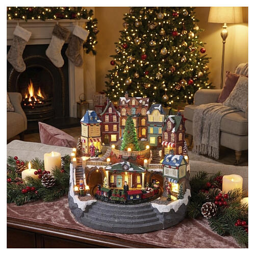 Pueblo navideño 40x40x30 cm ciudad con tren y árbol en movimiento LED multicolores y música 2