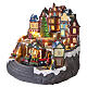 Pueblo navideño 40x40x30 cm ciudad con tren y árbol en movimiento LED multicolores y música s4