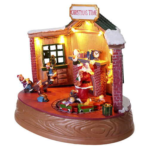 Villaggetto natalizio casa trenino movimento babbo Natale 20x25x20 cm 4