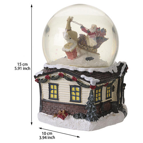 Glass snow ball with Father Christmas on his sleigh and music box, 6.1x4.3 in 3