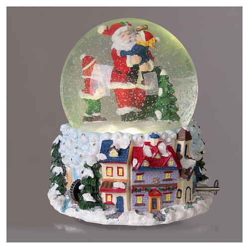 Globo de neve de vidro com Pai Natal, menino e caixa de música 20x20 cm 4