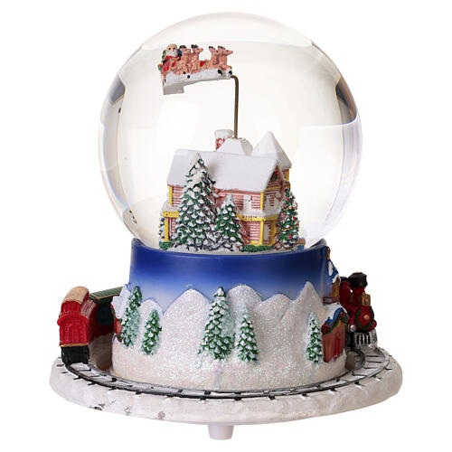 Villaggio natalizio animato con Babbo Natale slitta e trenino 15x15 cm 5