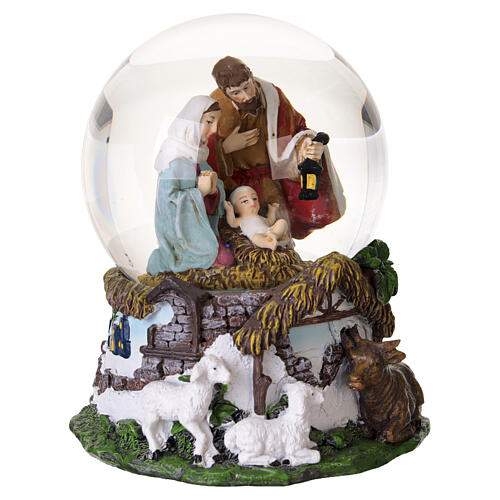 Natività con Sacra Famiglia in sfera di vetro musicale 15x10 cm 5
