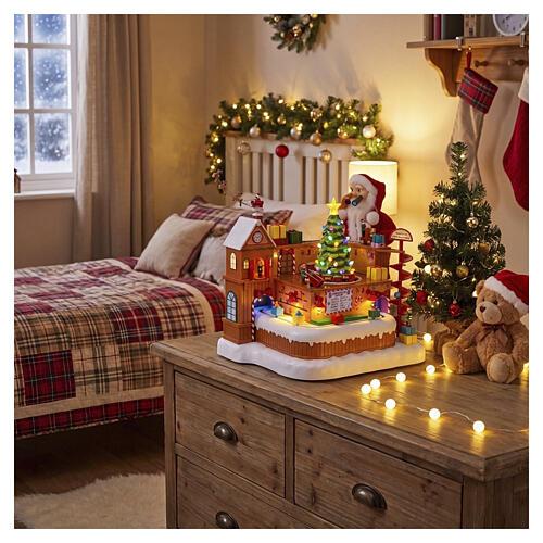 Villaggio animato fabbrica giocattoli Babbo Natale 8 movimenti luci e musica 40x35x30 cm 2