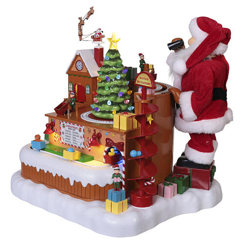 Villaggio animato fabbrica giocattoli Babbo Natale 8 movimenti luci e musica 40x35x30 cm 5