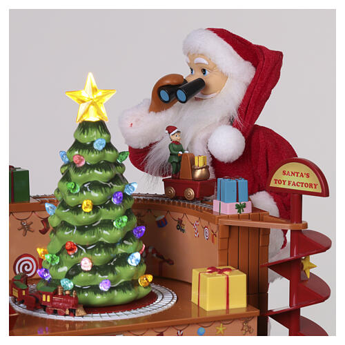 Villaggio animato fabbrica giocattoli Babbo Natale 8 movimenti luci e musica 40x35x30 cm 6