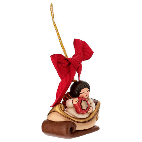 THUN Christmas ornament: ceramic composable sled with angel 3