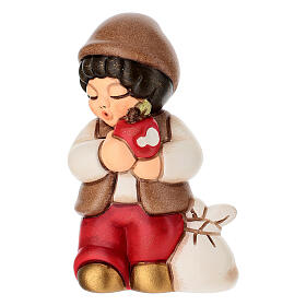 Bimbo con mela THUN rosso linea Presepe classico