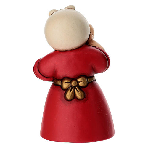 Donna con pesce in ceramica THUN linea Presepe Classico rosso 4