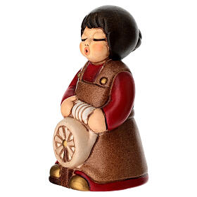 Woman with spinning wheel for red classic Nativity Scene by THUN