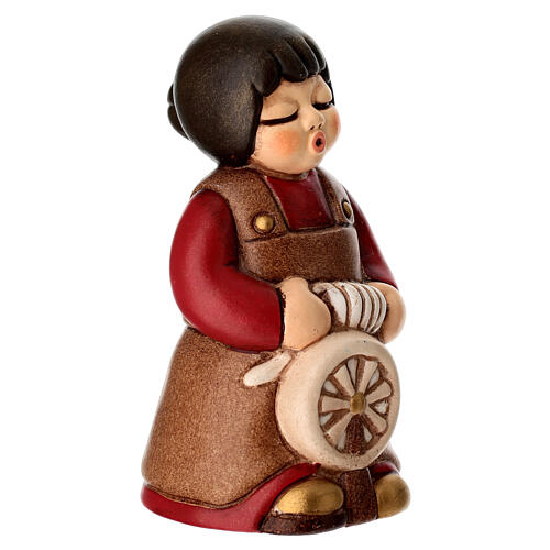 Woman with spinning wheel for red classic Nativity Scene by THUN 3