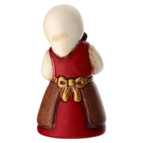 Woman playing the flute for THUN red Classic Nativity Scene 4