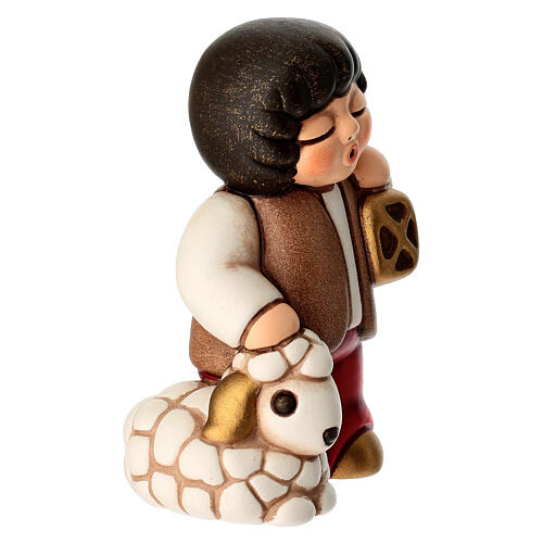 Boy with lantern ceramic figurine, THUN Classic Red Nativity 3