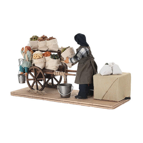 Vendedor de semillas con niño y carro 13x25x9 cm movimiento belén napolitano 14 cm 6