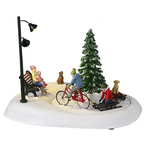 Snowbiking With Dad Tischakzent Lemax Vail Village 17x23x19 cm - 34087 1