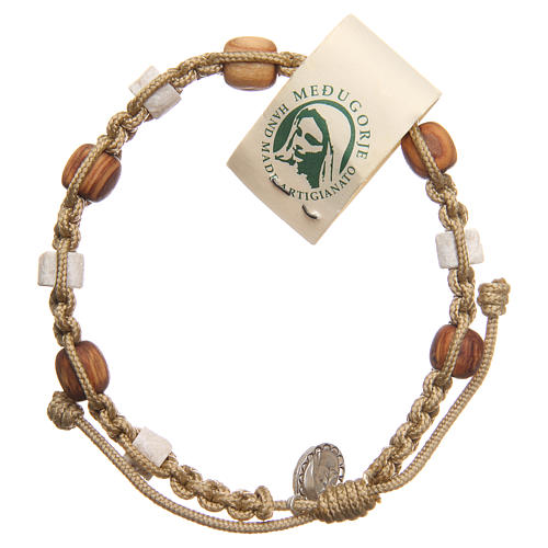 Bracelet in olive wood with grains in white Medjugorje stone and beige cord 1