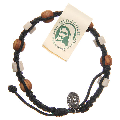 Bracelet in olive wood with grains in white Medjugorje stone and black cord 1