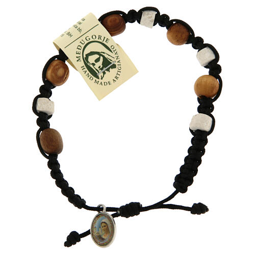 Bracelet in olive wood with grains in white Medjugorje stone and black cord 1