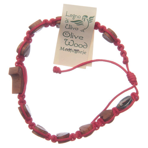 Handmade Medjugorje bracelet, composed by red cord, hearts and Tau in olive wood 2