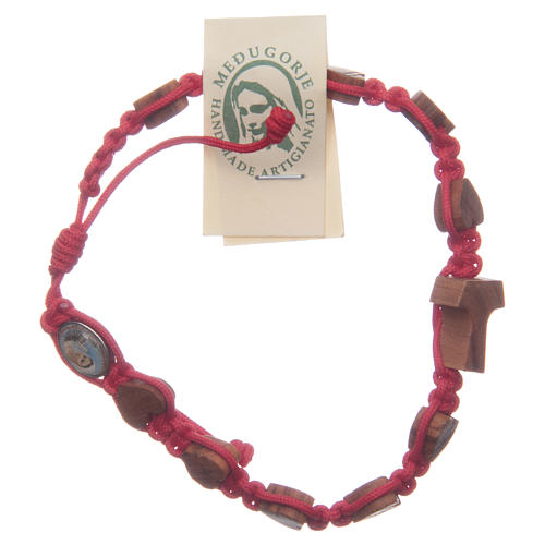 Handmade Medjugorje bracelet, composed by red cord, hearts and Tau in olive wood 1