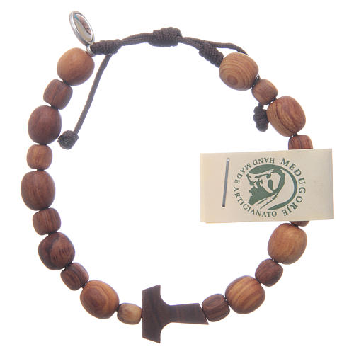 Bracelet in olive wood with tao 1