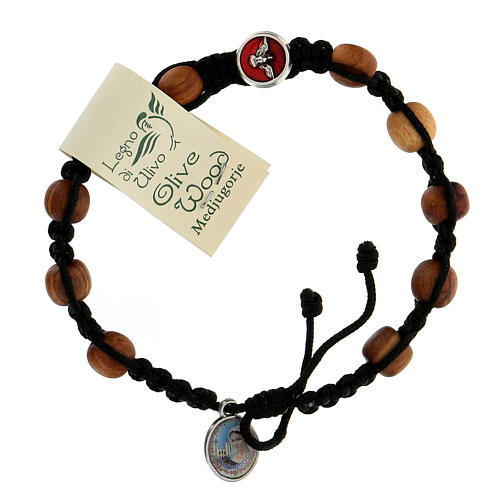 Medjugorje single decade rosary bracelet with Holy Spirit medallions, olive wood grains and black rope 1