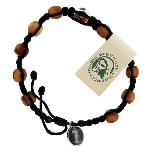 Medjugorje single decade rosary bracelet with Holy Spirit medallions, olive wood grains and black rope 2