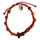 Bracelet handmade in Medjugorje, made of beads and tau cross in olive wood s1