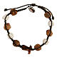 Bracelet with grains and tau cross in olive wood tied together by a brown rope s2