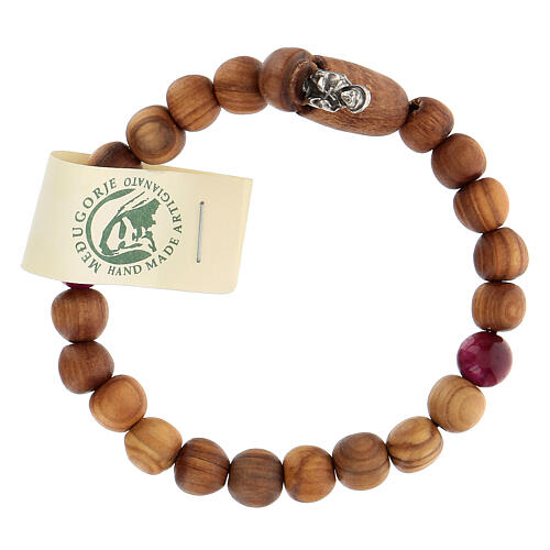 Medjugorje bracelet with wooden grains and two grains of assorted colours 1