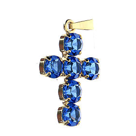 Croix pendentif cristaux ronds bleus sertis