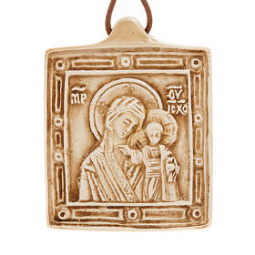 Medalla de piedra de la Virgen con el Niño Belén