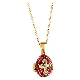 Egg-shaped red opening pendant, Russian Imperial style, with budded cross and star