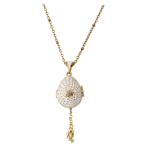 Pendentif ouvrant style impériale russe oeuf blanc croix et étoile 7