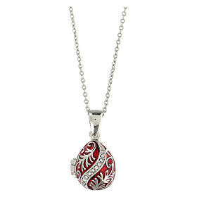 Opening pendant in Russian Imperial egg style, red and silver, curved lines and leaves