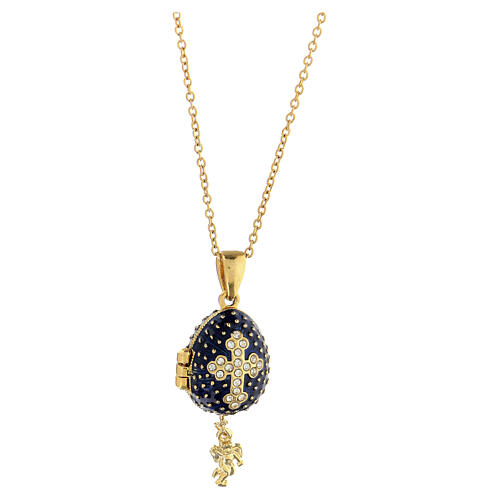 Dark blue opening pendant, Russian Imperial egg style, budded cross and star 5