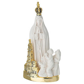 Virgen de Fátima de resina con base e iglesia oro 15x7 cm