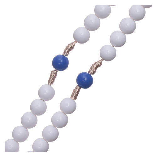 Rosary in blue plastic with white grains and blue pater 7,5 mm silk setting 3