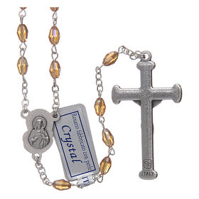 Chapelet or en cristal avec croix et médaille en métal oxydé